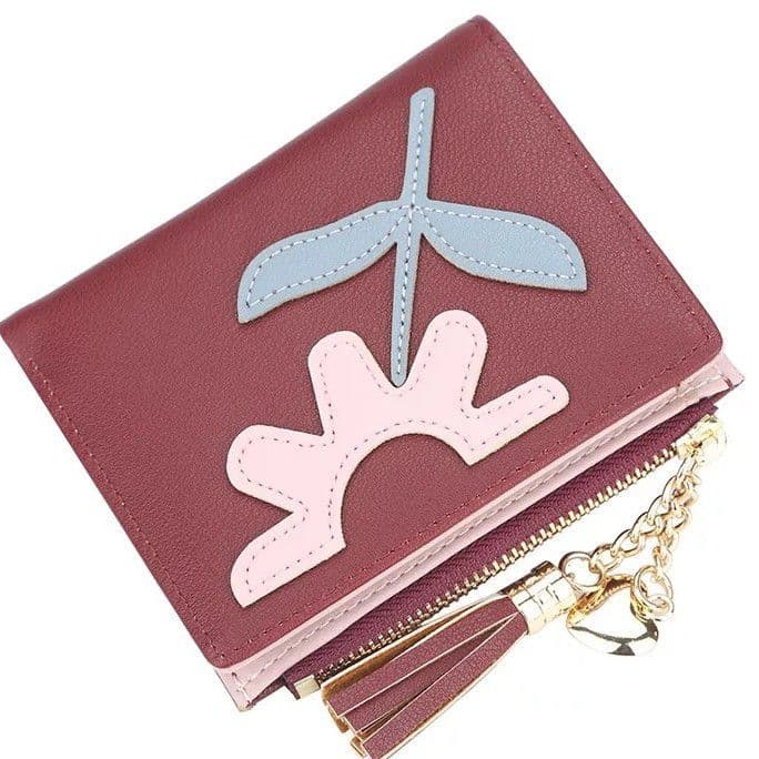 Dompet Warna Maroon dengan resleting aksesoris rumbai