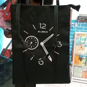 ini adalah Totebag Analog, size: 40cm x 35cm, material: canvas, color: black, brand: totebagbjnindonesia, age_group: all ages, gender: female