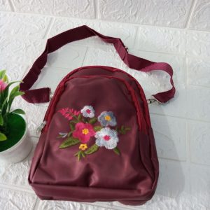 ini adalah Tas Elra Marun, size: 20 cm x 15 cm, material: Mikro, color: maroon, brand: tas bahu indonesia, age_group: all ages, gender: female
