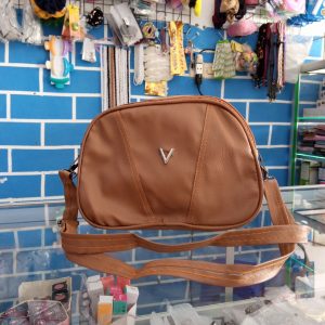 ini adalah Tas Tera Coklat, size: 24 cm x 21 cm, material: synthetic, color: chocholate, brand: tasteraindonesia, age_group: all ages, gender: female