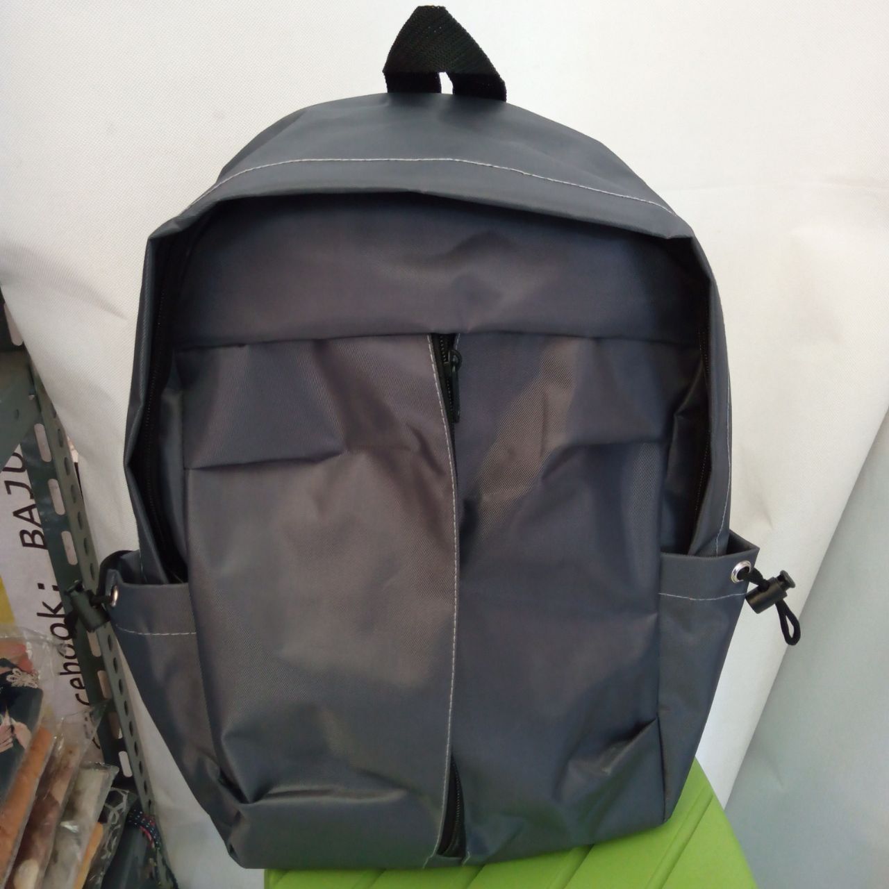 ini adalah Tas Boi Abu, size: 35 cm x 30 cm, material: mikro, color: grey, brand: tasranselboiindonesia, age_group: all ages, gender: unisex