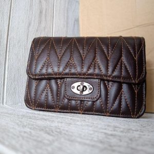 ini adalah Tas Athena Coktua, size: 18 cm x 13 cm, material: synthetic, color: dark chocholate, brand: tasathenabojonegoro, age_group: all ages, gender: female