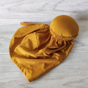 Ini adalah Ciput Cepol Mustard size: L, material: spandex, color: yellow mustard, brand: ciputjilbabbojonegoro, age_group: all ages, style: muslimah aksesori, gender: female, pattern: plain,
