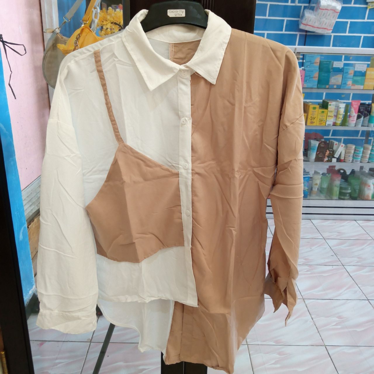 Ini adalah Blouse Luki Putih Coksu size: LD 100cm, material: cotton, color: chocholate milk, brand: blouselukibojonegoro, age_group: all ages, style: simply blouse, gender: female, pattern: plain,