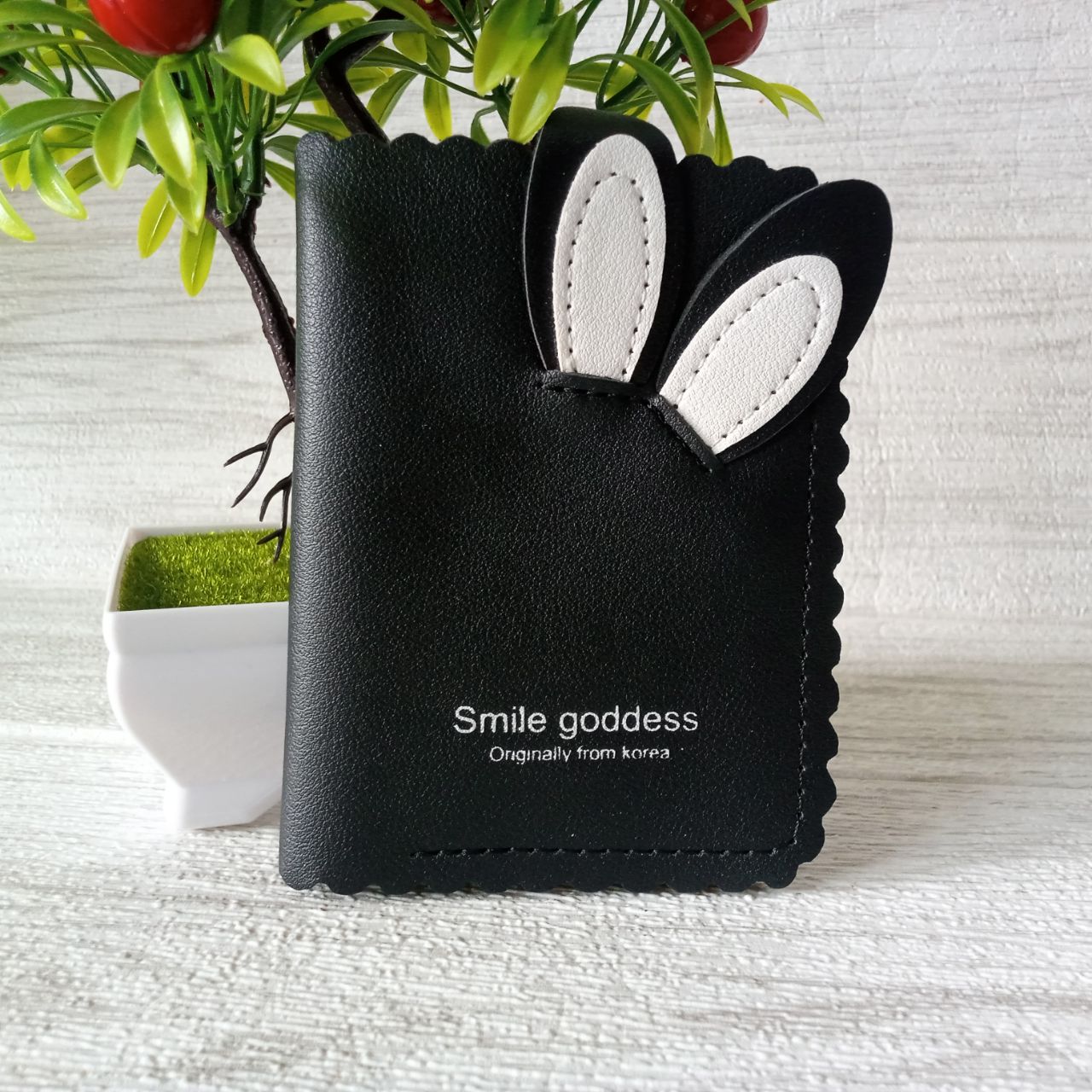Ini adalah Dompet Renda Kelinci Hitam size: Mini, material: sintetis, color: black, brand: dompetrendabojonegoro, age_group: all ages, style: simple teen wallet, gender: female, pattern: embroidered leather with a rabbit pattern,