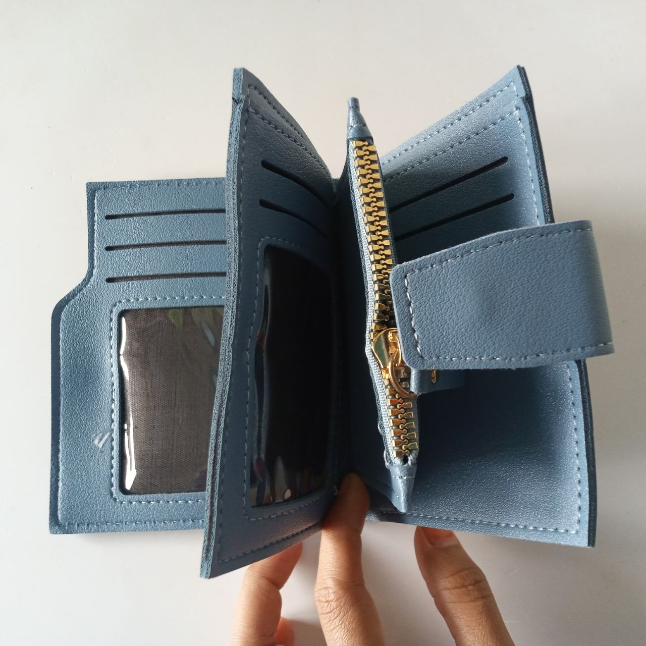 Ini adalah Dompet D26 Biru size: 13x9, material: synthetic leather, color: blue, brand: dompetd26bojonegoro, age_group: adult, style: simple mini wallet, gender: female, pattern: leather d26,