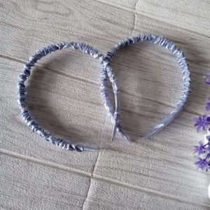 Ini adalah Bando Skranci Birmud size: L, material: pvc, color: light blue, brand: bandoskrancibojonegoro, age_group: all ages, style: casual bandana, gender: female, pattern: skranci,
