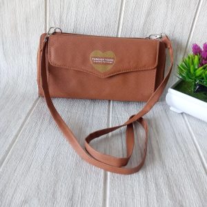 Ini adalah Dompet Seruni Coklat size: Large, material: sintetis, color: chocholate, brand: Dompetindonesia, age_group: all ages, style: Sling and Taxi Wallet, gender: female, pattern: plain,