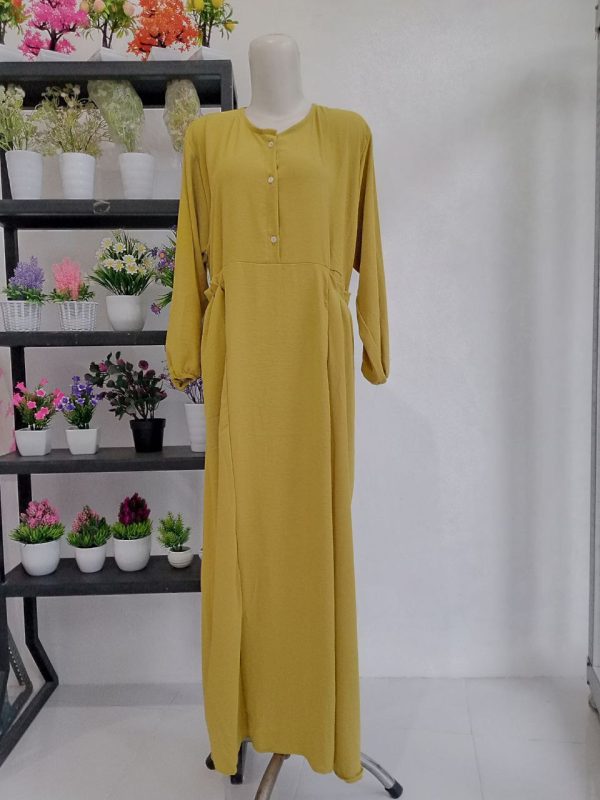 Ini adalah Gamis Crinkle Chika Lemon size: L, material: crinkle, color: yellow lemon, brand: Gamischika, age_group: all ages, style: fashionable dress, gender: female, pattern: plain,