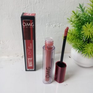 Ini adalah Lipcream OMG 21 brand: OMG - Oh My Glam Matte Kiss Lip Cream, age_group: all ages, gender: female, capacity: 3.5 ml, ingredients: isododecane,aluminum starch octenylsuccinate,trisiloxane,diisostearyl malate,trimethylsiloxysilicate,silica dimethyl silylate,disteardimonium hectorite,ethylhexyl palmitate,polyglyceryl-6 polyhydroxystearate,propylene carbonate,polyhydroxystearic acid,cyclopentasiloxane,phenoxyethanol,polyglyceryl-6 polyricinoleate,ethylhexylglycerin,caprylyl methicone,dimethicone/vinyl dimethicone crosspolymer,fragrance,aluminum hydroxide,triethoxycaprylylsilane,simmondsia chinensis (jojoba) seed oil,tocopheryl acetate,tocopherol,ascorbyl palmitate. may contain: ci 77491,ci 77891,ci 77492. ci 15850:1,ci 77499,ci 15850,ci 15850:2,