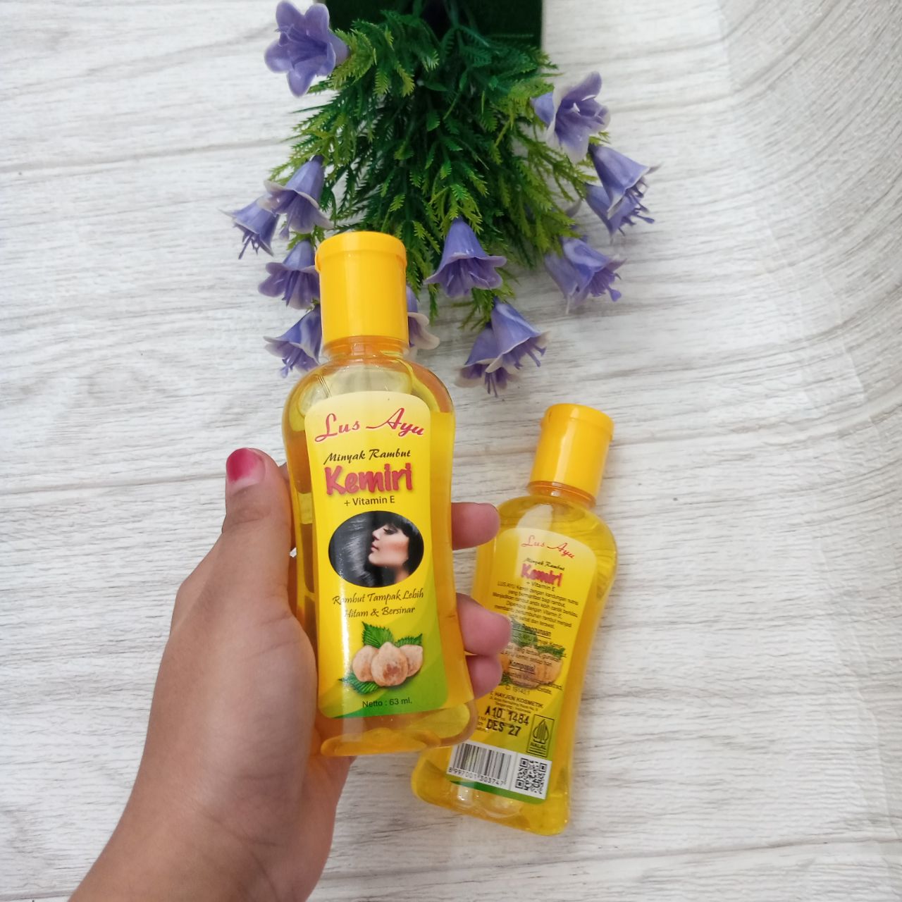 Ini adalah Lus Ayu Minyak Kemiri brand: Lus Ayu, age_group: all ages, gender: female, capacity: 63 ml, ingredients: Mineral Oil, Aleurites Moluccana Extract, Fragrance, Tocopheryl Acetate, CI 19140;1,